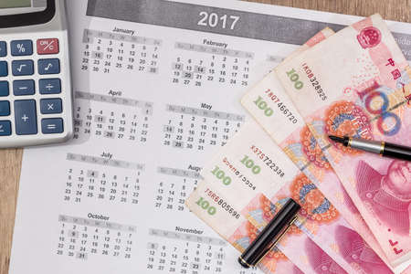 calendar event with chinese yuan, close up.の写真素材