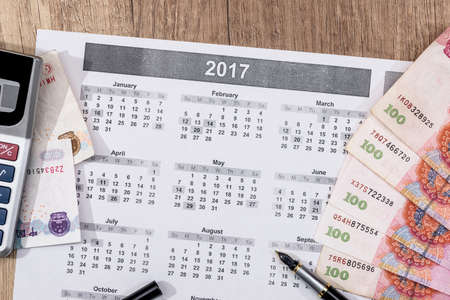 calendar event with chinese yuan, close up.の写真素材