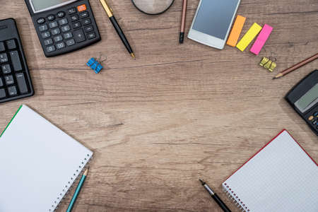 different office objects on a table. place for text