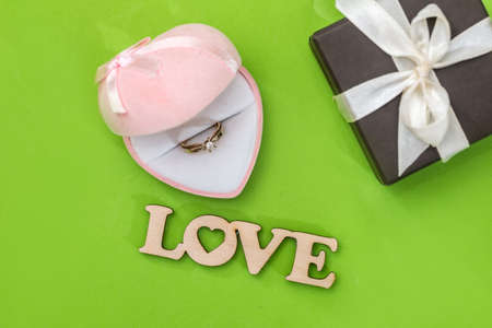 wedding box with gold ring and text love