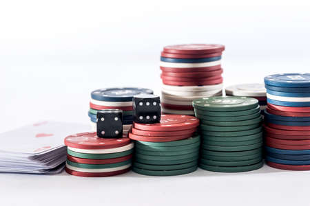 play card with poker chips isolated on white