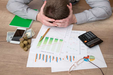 businessman working with business graph in office