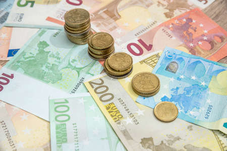 euro banknotes and coins
