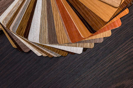 wood color guide for sample on desk.