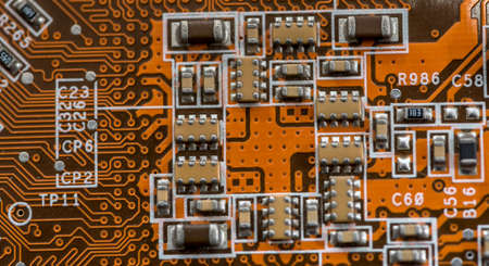 Electronic electronic circuit as background orange.