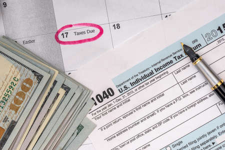 2017 tax form 1040 with dollarの写真素材