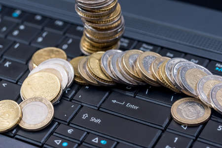 euro cin on laptop, business concept, close upの写真素材