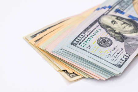 business concept - many dollars banknotes, isolated on whiteの写真素材