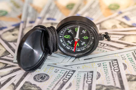 money concept - compass with dollar. close up.の写真素材