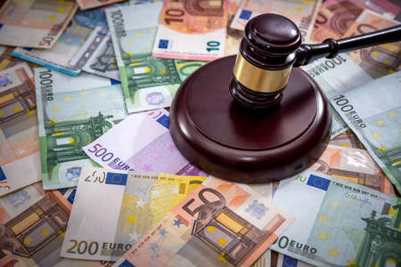 Judge's hammer with Euro currency