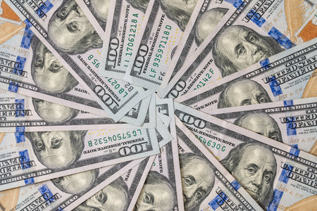 us dollar on wooden tableの写真素材