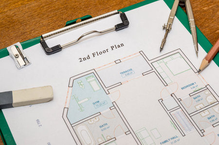 house floor plan with drawing compass and pencilの写真素材
