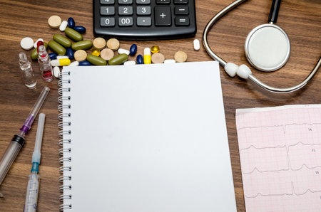 empty notepad with medical equipment for medical concept