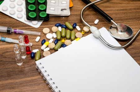 empty notepad with medical equipment for medical conceptの写真素材