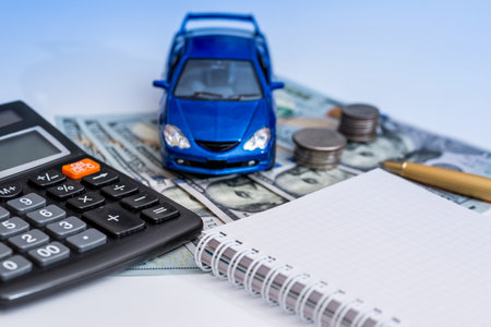 blue toy car, money, notepad
