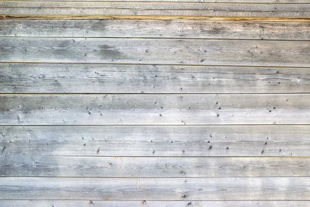 gray wooden fence panels as background close upの写真素材