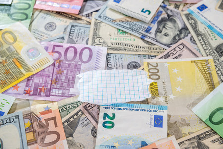 a pair of two provincial currencies - US dollar and Euro banknotes.の写真素材