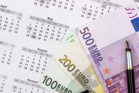 100 200 500 euro bills on calendar.の写真素材