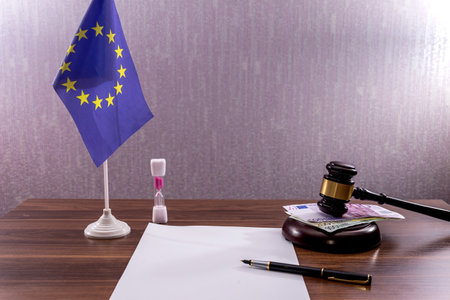 empty notepad with hammer, euro bills and pen