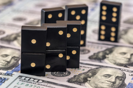 black dominoes above us dollarの写真素材