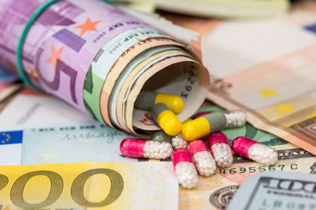Pharmaceutical business. euro banknotes with pills.の写真素材