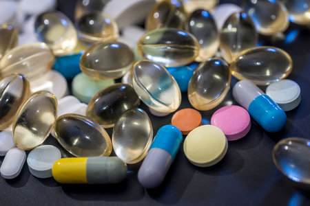 Medical pills isolated on the black backgroundの写真素材