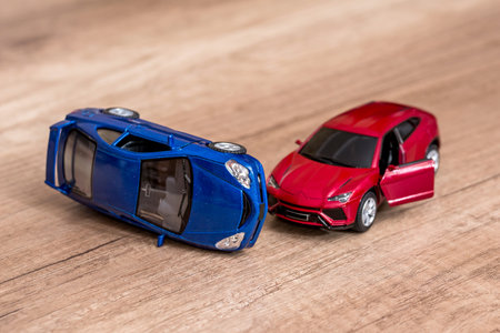two toy cars on deskの写真素材