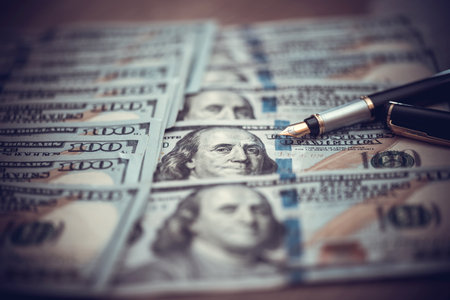 dollar with penの写真素材