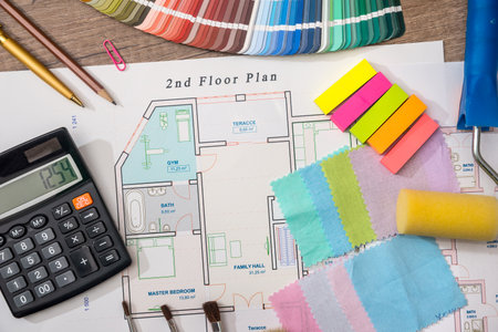 scheme house with a palette of colors and a calculatorの写真素材