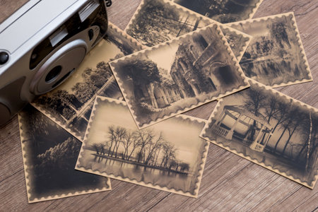 old camera with photos. vintageの写真素材