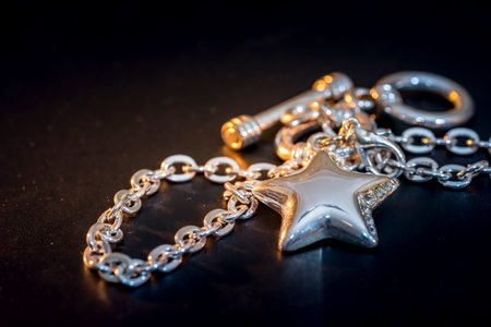 Beads and gems bracelet isolated on dark blue.の写真素材