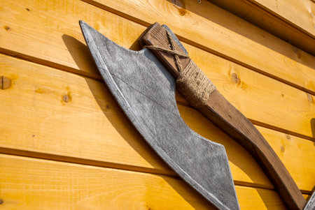 medieval weapons on wooden desk. close up