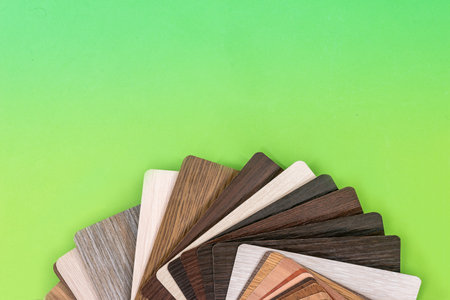 Samples of laminate or furniture isolated on green