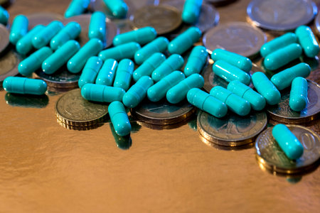 green pills and next to euro coins
