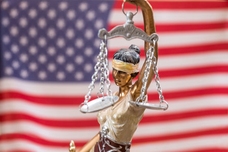 femida against usa flag. close upの写真素材