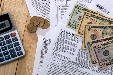 money on the background of the tax returnの写真素材