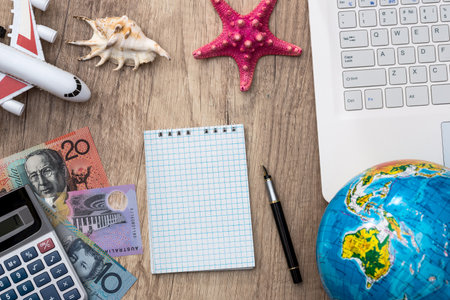 Summer and travel concept - airplene money and globeの写真素材