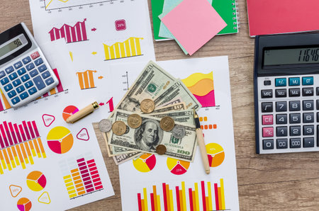 American money on business graph background, close upの写真素材