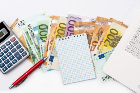 Conception of business, euro money, laptop and calculatorの写真素材