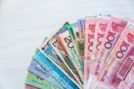 Collection of four countries banknote on wooden tableの写真素材
