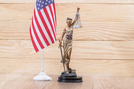 femida against usa flag. close upの写真素材