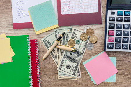 Family budget planning, dollar with pen and notepadの写真素材