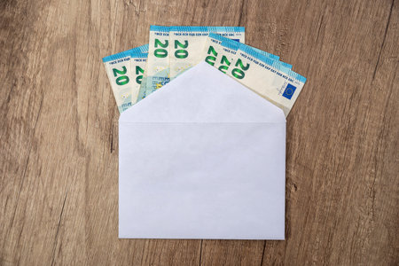 Envelope with Euro bank notes - close upの写真素材