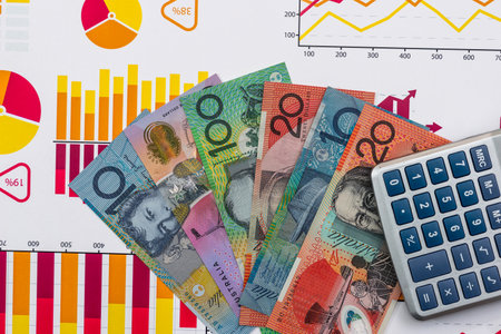 Business report with australian dollar and calculatorの写真素材