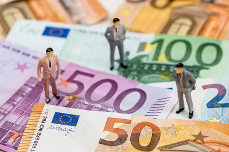 small toys people are on euro.の写真素材