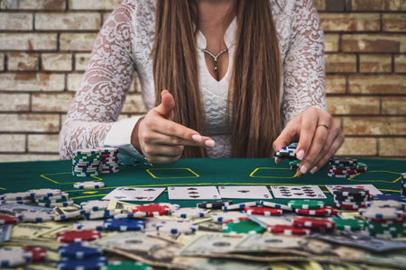 Making a bet in casino, brick wall background