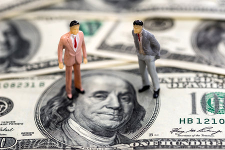 toys people on one hundred dollar denominationsの写真素材