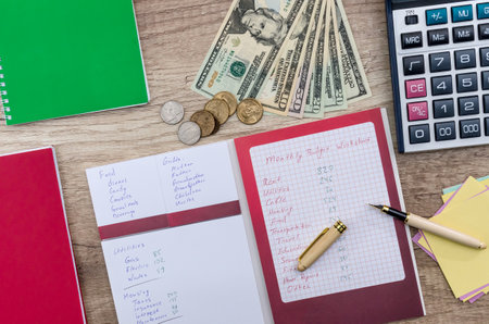 'Monthly budget planning' concept on wooden table