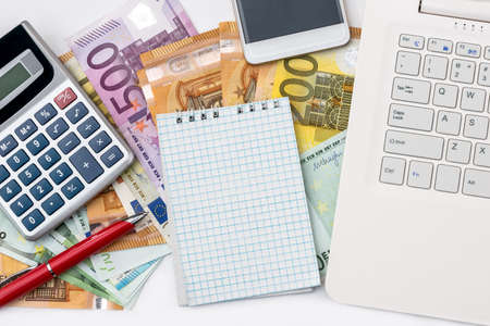 Euro cash and workplace conception isolated on white