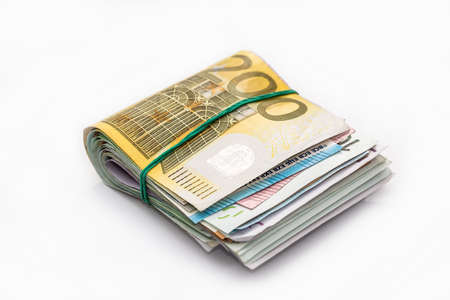 Different euro banknotes in bundle isolated whiteの写真素材